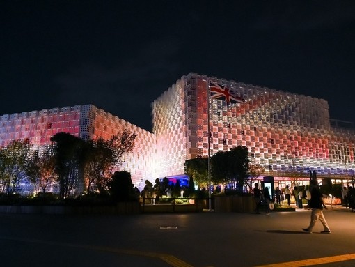 People arriving at a conference centre