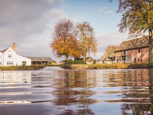 Overlooking the lake in front of the buildings of