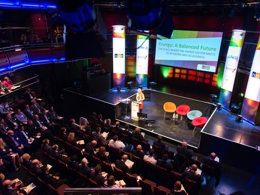 A speaker on stage at the NOF Energy National Conference and Exhibition