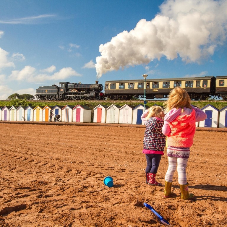 beach huts, steam train railway seaside summer at PaigntonÂ