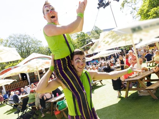 Two acrobats strike a pose at George Square during the Edinburgh Festival Fringe.