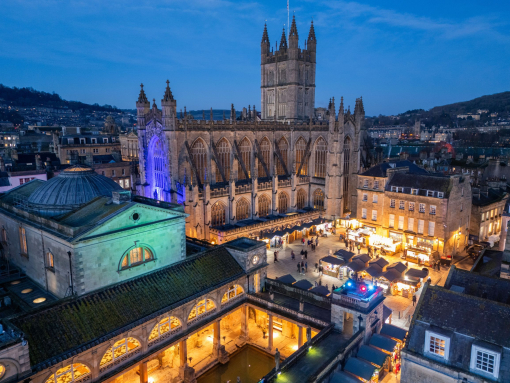 A cathedral, a market and a historic spa lit up at night