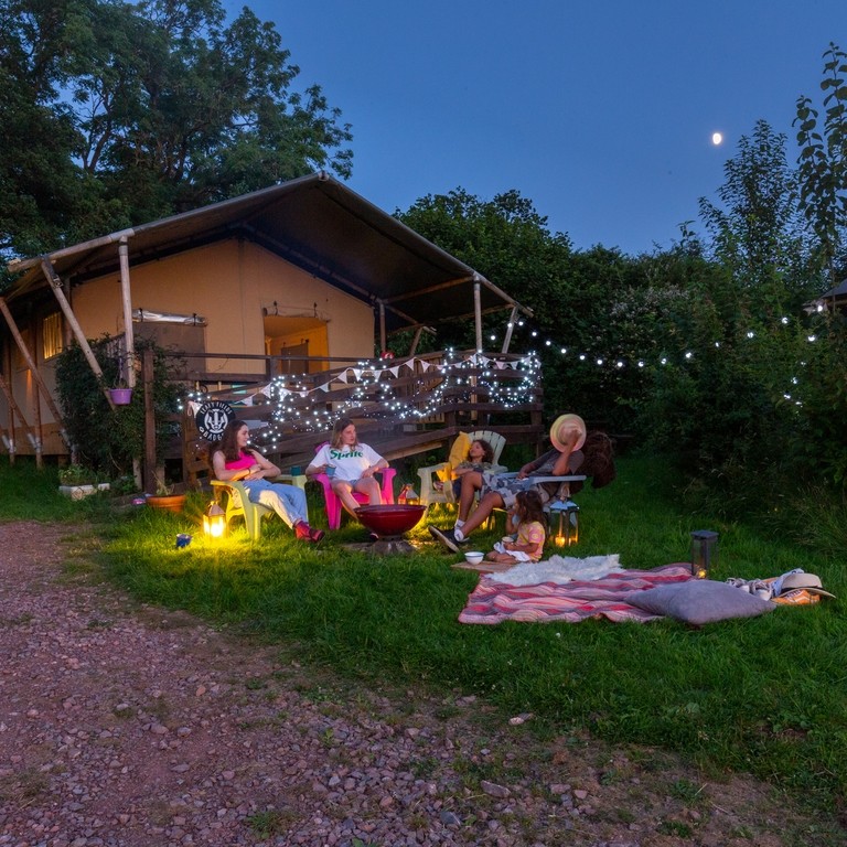 19. TOOLKIT ONLY Group of campers Leafy Field Glamping